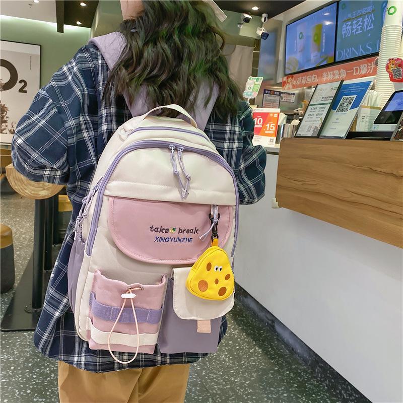 Large-capacity schoolbag female high-value junior high school college student backpack Mori style cute versatile student backpack