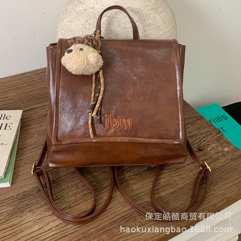 Oily leather retro women's backpack 2025 new fashion commuting versatile backpack exquisite small schoolbag travel bag