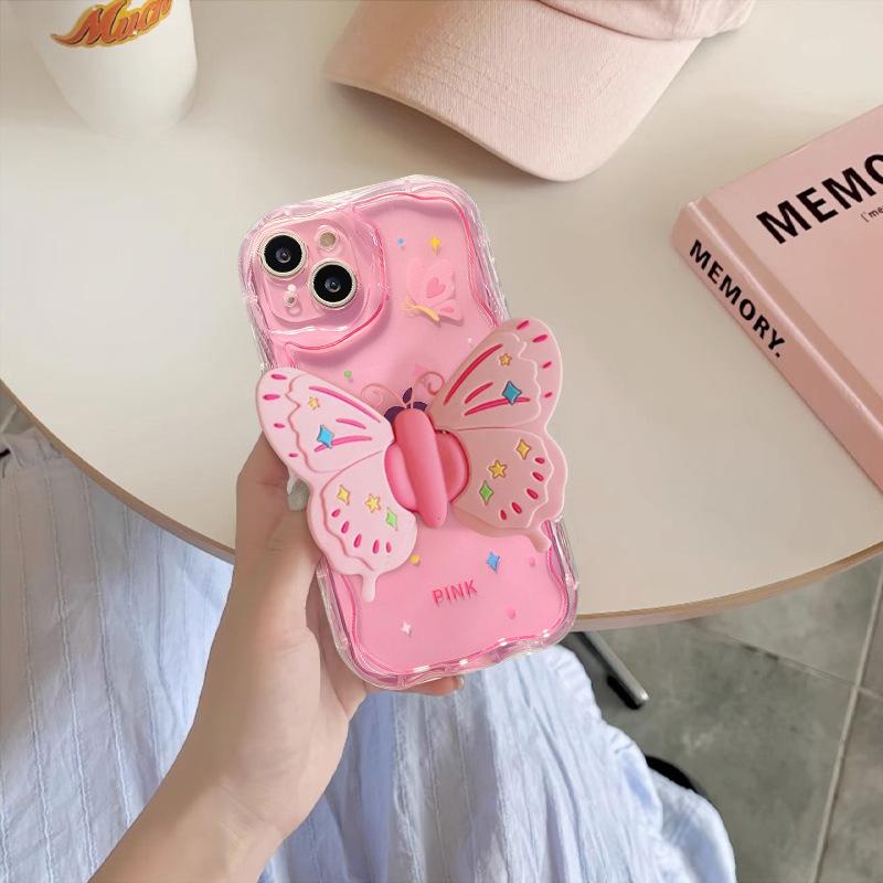 Applicable to Apple 15 mobile phone case iPhone14promax/13 cute three-dimensional bow holder 11/12 silicone