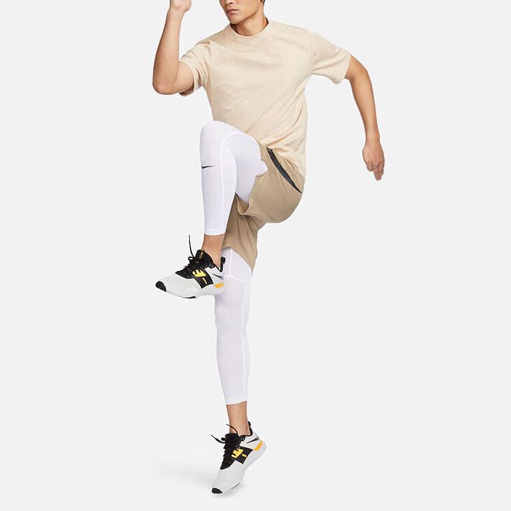 Nike Pantaloni Sportivi da Allenamento Fitness Casual a Colore Singolo Vita Media Uomo Pantaloni Bianchi FB7953-100