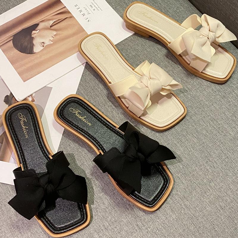 Bow slippers women's summer wear new fashion home flat bottom non-slip fairy wind one-word sandals soft bottom