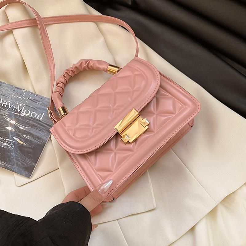 

Korean version ins women s gentle temperament pleated handbag 2025 summer new foreign style rhombus shoulder messenger bag рожевий