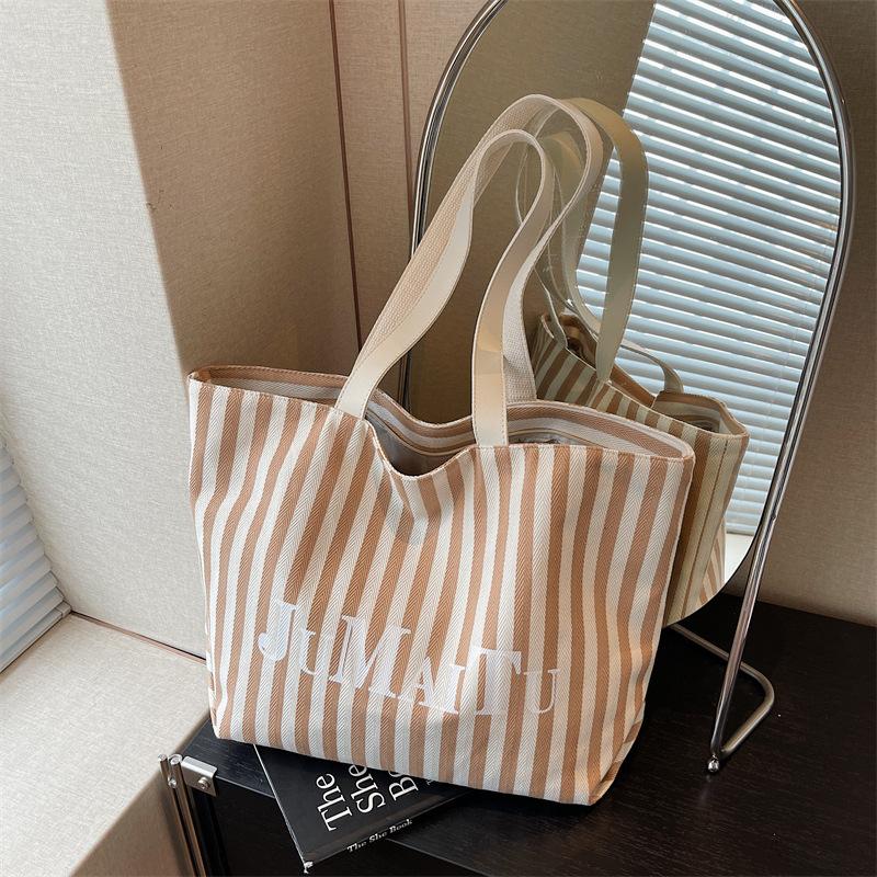 

Нишевый дизайн модная полосатая сумка-тоут женская новая большая вместимость ленивый ветер сумка на плечо холщовая сумка хаки