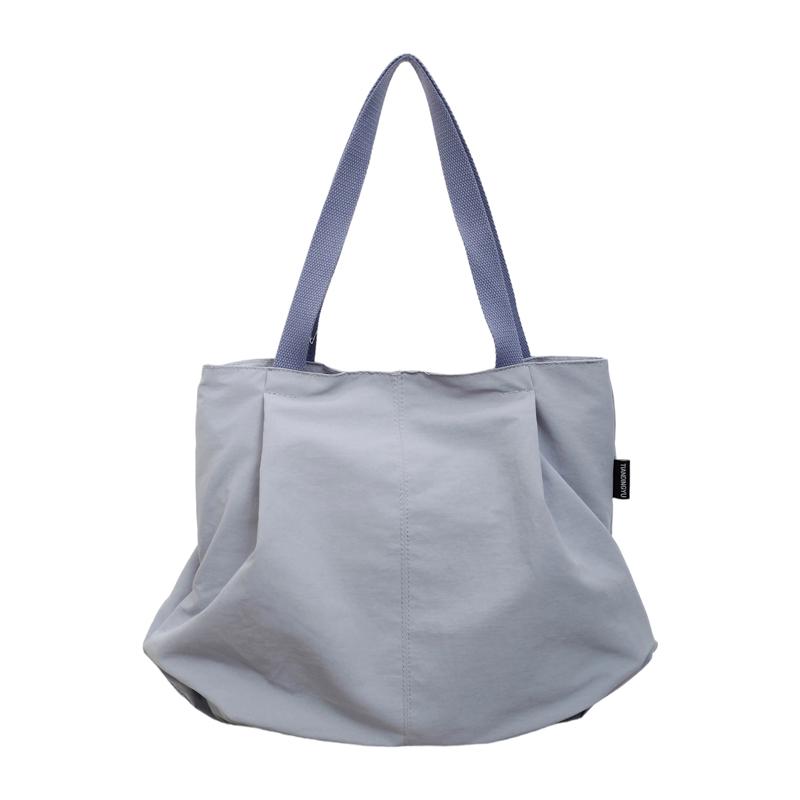Minimalist Nylon Tote Bag with Spacious Design and Durable Handles Perfect for Everyday Use and Shopping