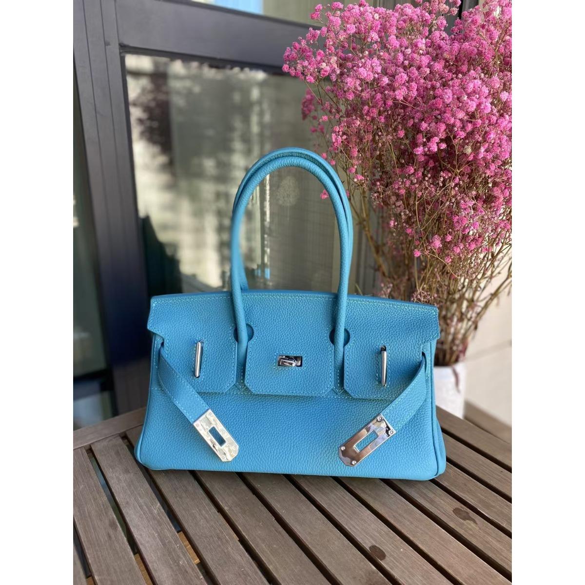

Foreign trade cross-border new togo first-layer cowhide texture handbag women s genuine leather underarm shoulder bag horizontal platinum bag 30cm horizontal platinum bag синій