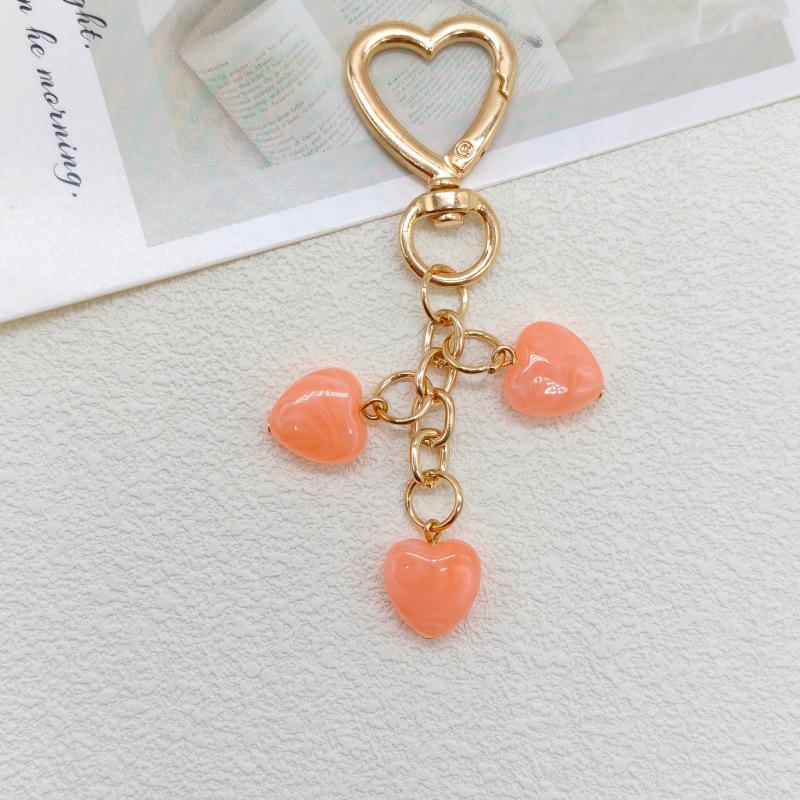 Koreańska Moda Breloczek z Serduszkiem i Smyczka do Telefonu z Zawieszką z Koralików