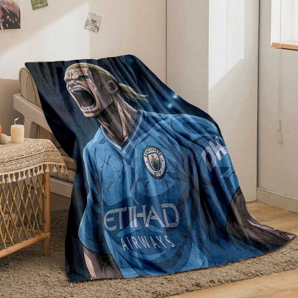 The pattern depicts a fierce animated figure in a blue soccer jersey. for all seasons blanket lunch break throw gift