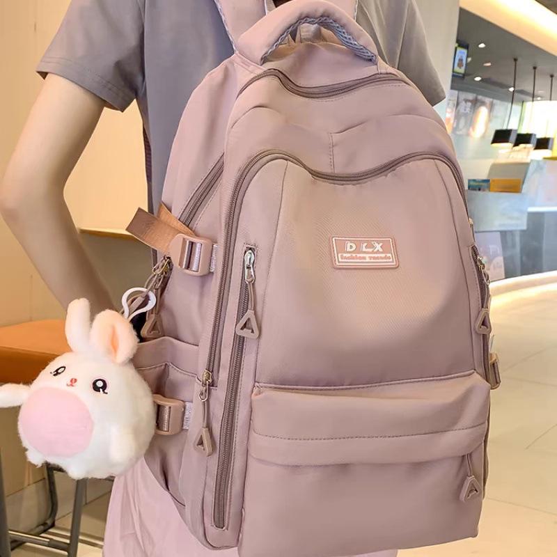 

2025 Новая модель школьного рюкзака для девочек: Большая вместимость для начальной, средней и старшей школы, идеально подходит для путешествий No Decoration