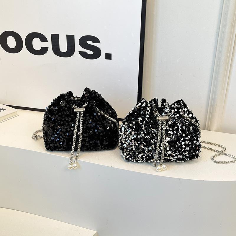 Fashion personalized sequined bucket bag women's new foreign style Korean version shoulder bag crossbody dinner bag tide fold