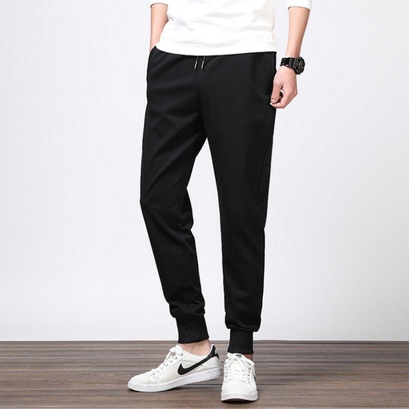 

Casual Pants Men s Summer and Autumn Trend Small Feet Large Size Showing Height Loose Fat Solid Color Sports Tied Feet Nine-point Pants Versatile M чёрный