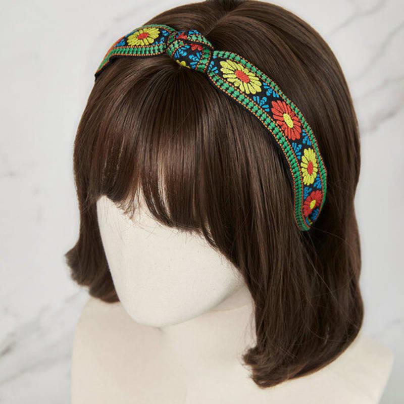 MAIA Grünes florales Jacquard-Haarband - Geknotet Orange Grün