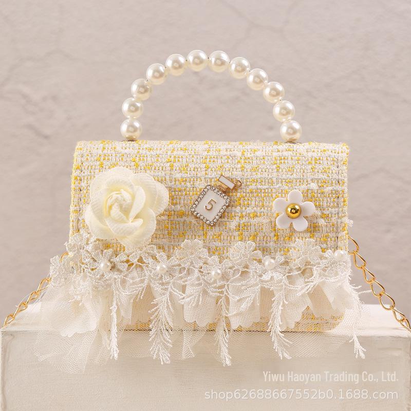 

Сумка для малышей Xiaoxiangfeng Snowflake Velvet Princess с жемчужной ручкой жёлтый