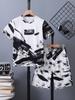 2-Piece Set for Boys (Big Kids) - Trendy and Cool Graffiti/Ink Painting Print - Simple and Casual Short-Sleeve Top and Shorts Set for Spring/Summer.