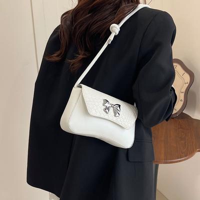 Petit sac à texture premium 2025 nouveau sac bandoulière polyvalent pour femme Sac bandoulière sous le bras de niche française Sac baguette française