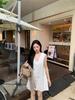 Women's Stylish V-Neck Sleeveless Summer Dress: Loose Fit, Slimming, Solid Color, Short Skirt - New Fashion Collection.